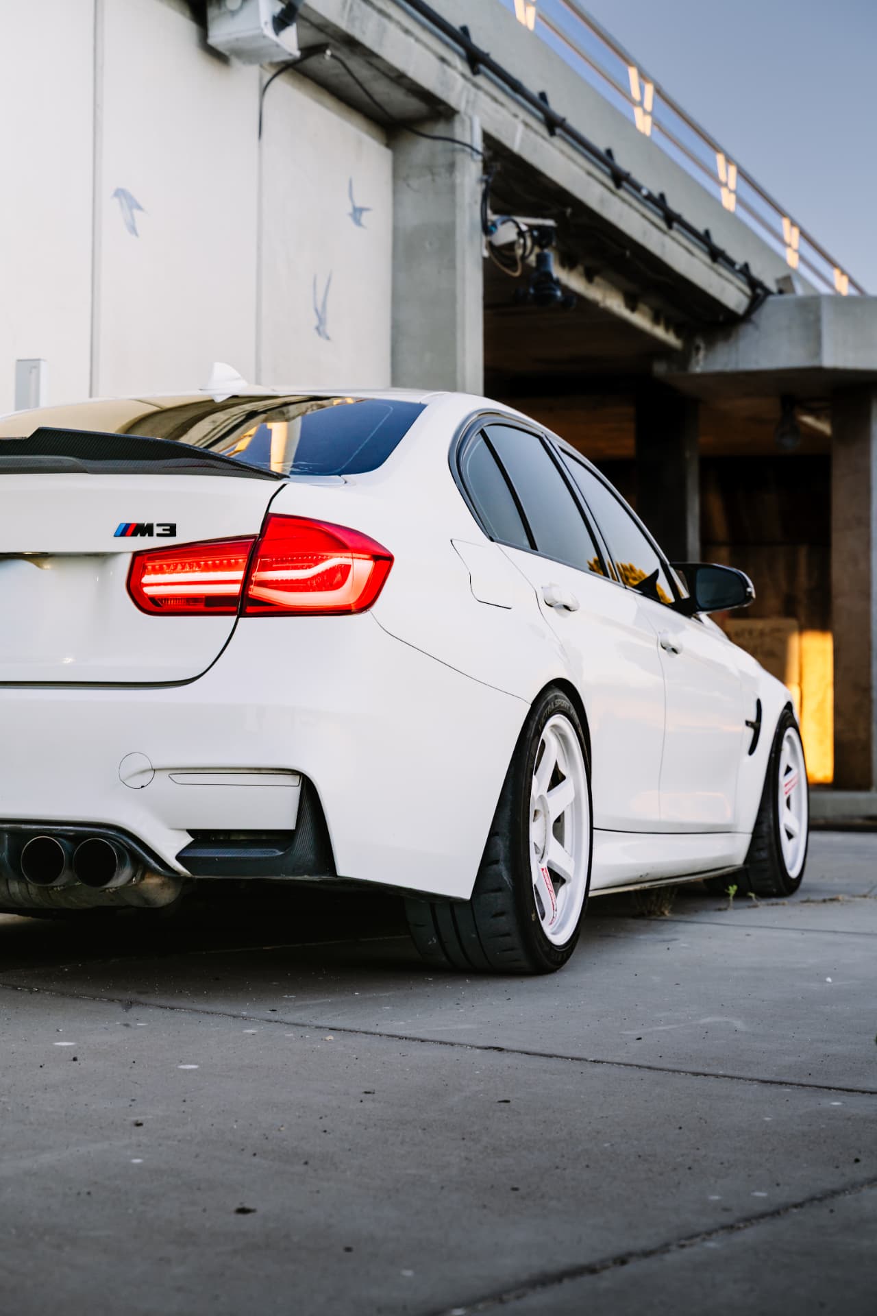 BMW M3 F80 rear quarter under the overpass