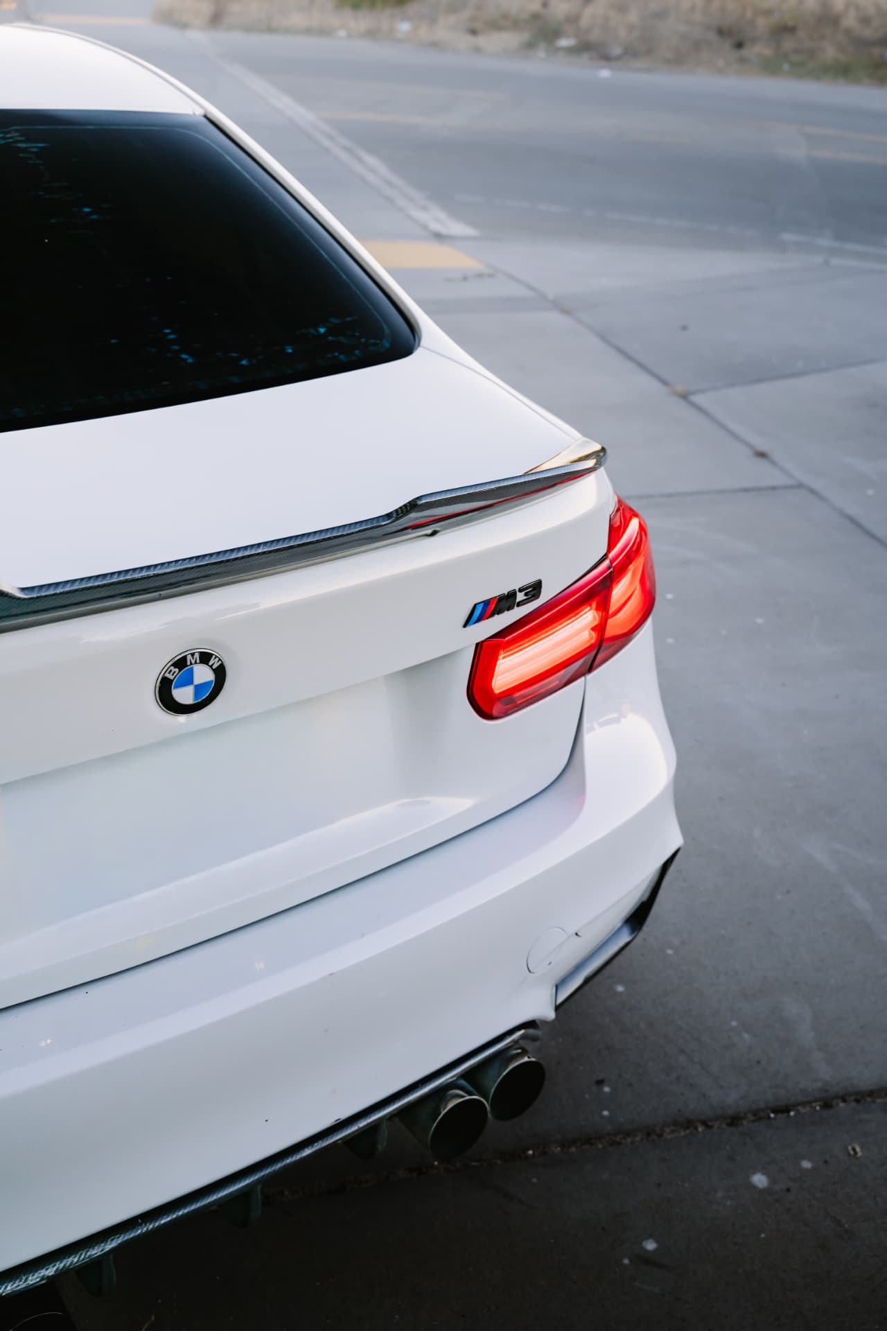 Carbon spoiler and tail light detail on the BMW M3 F80
