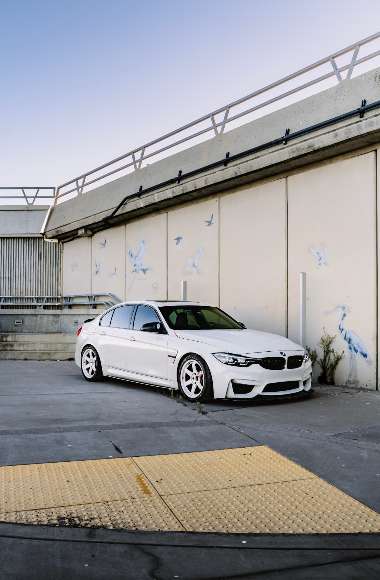 BMW M3 F80 wide shot beside the concrete stairs